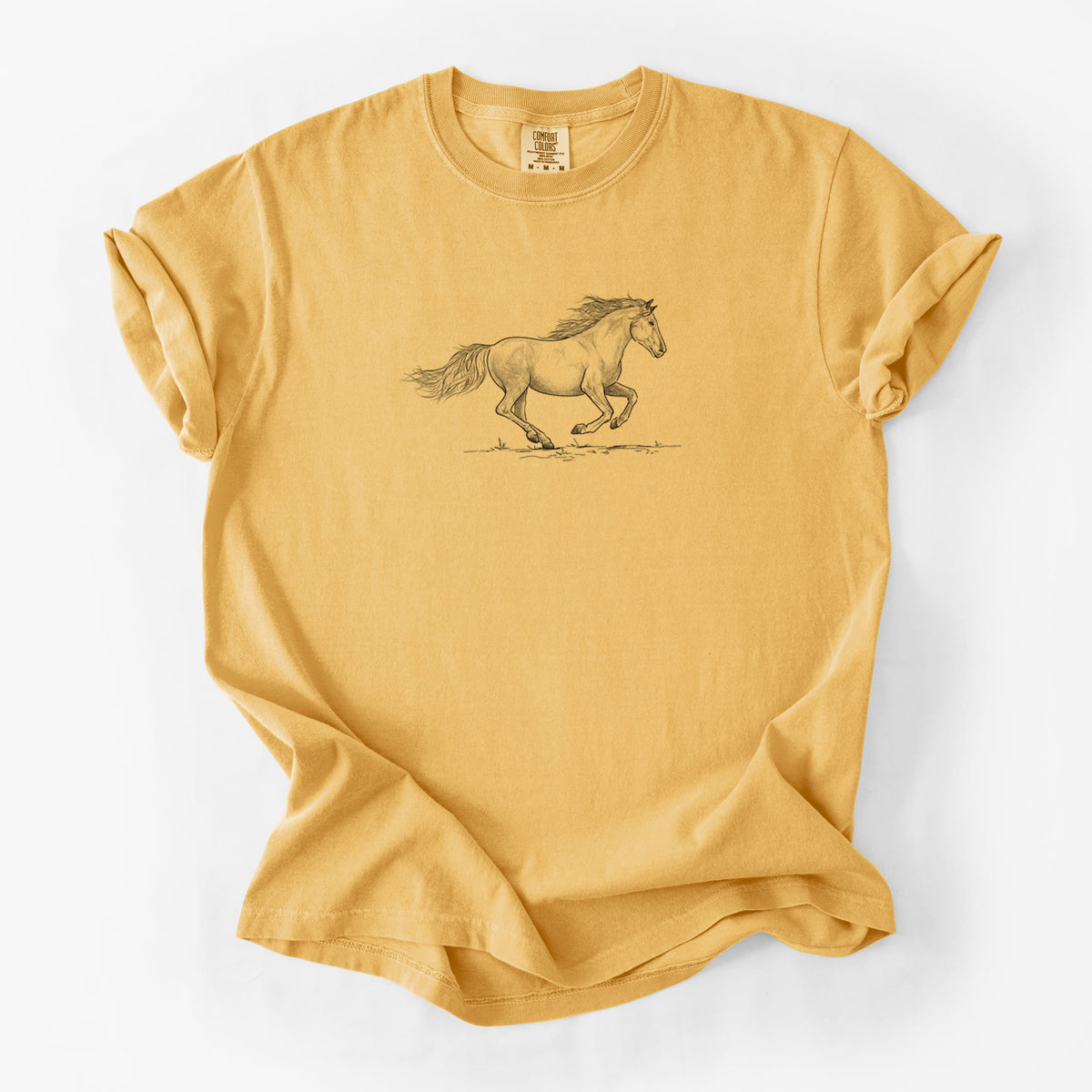 Golden wheat yellow Comfort Colors t-shirt laid flat, printed with a black ink illustration of a mustang horse running.