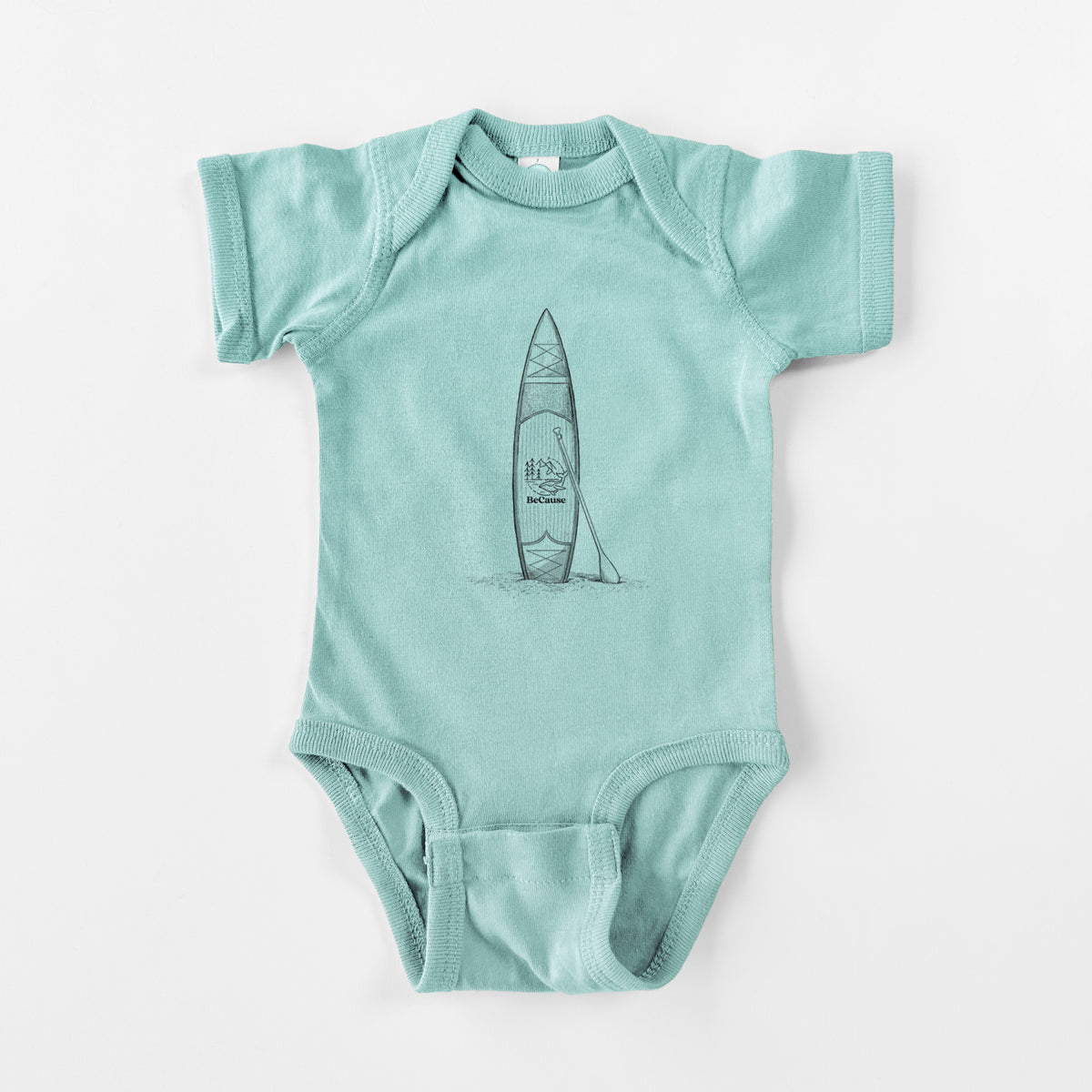 Saltwater baby bodysuit laid flat, printed with a black ink illustration of a stand-up paddleboard with a paddle.