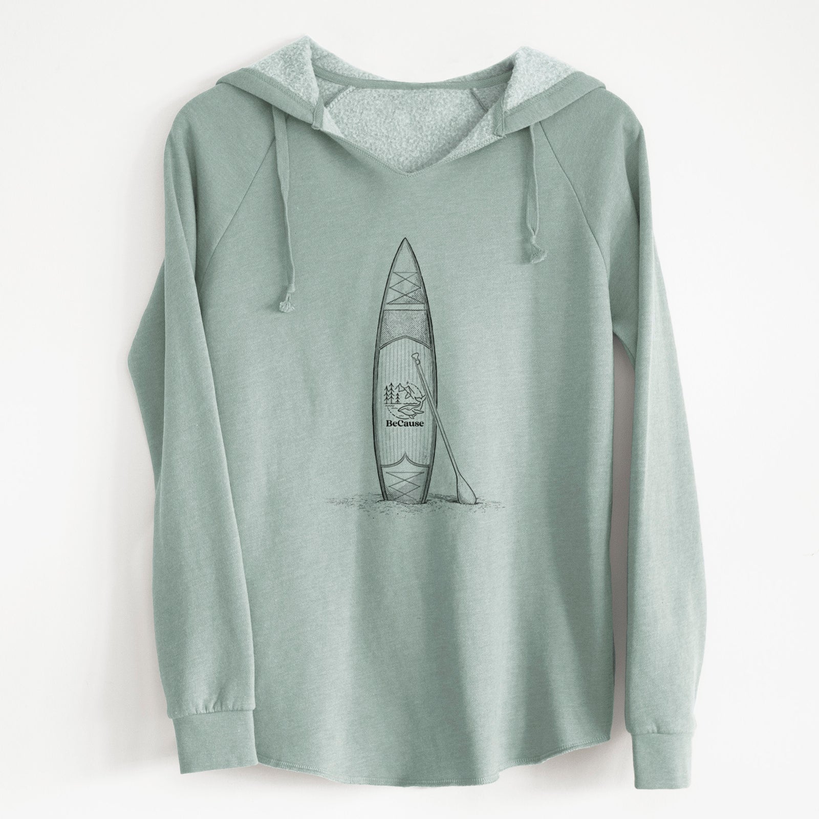Sage green women's Cali Wave hooded sweatshirt laid flat, printed with a black ink illustration of a stand-up paddleboard with a paddle.