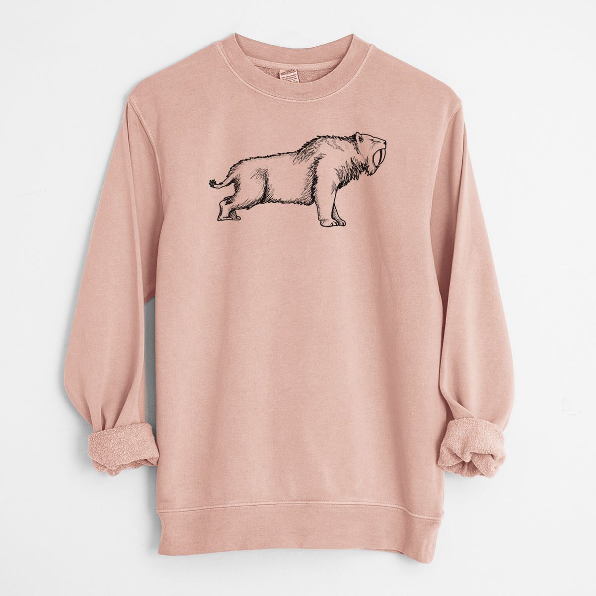 Dusty pink pigment dyed crewneck sweatshirt laid flat with the sleeves rolled, printed with a black ink illustration of a saber-toothed tiger walking.