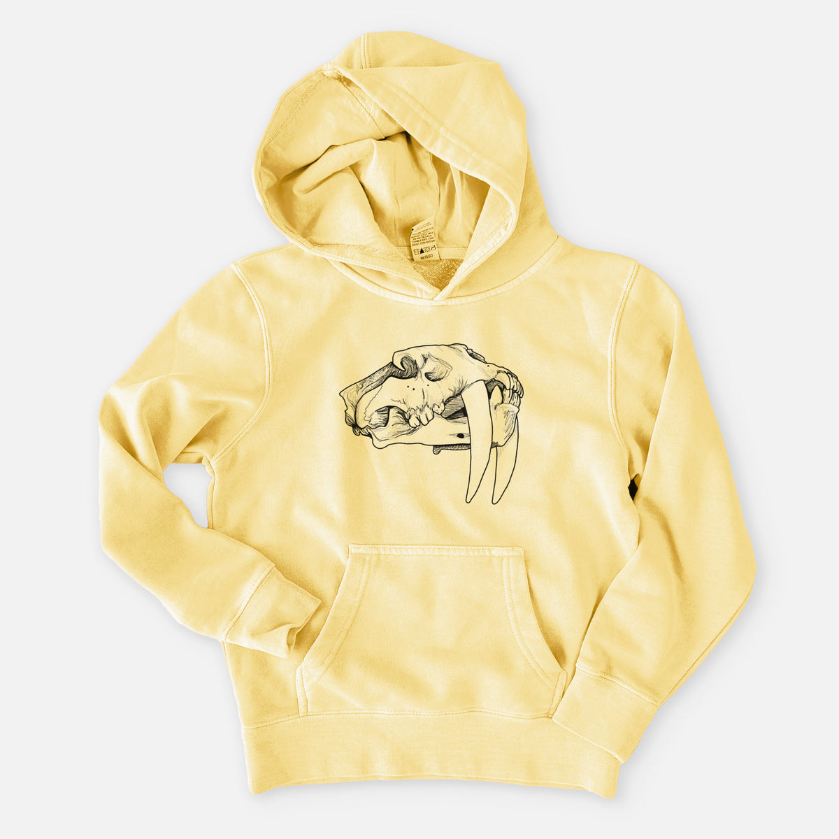 Pigment yellow youth pigment dyed hoodie laid flat, printed with a detailed black ink illustration of a saber-toothed tiger skull.