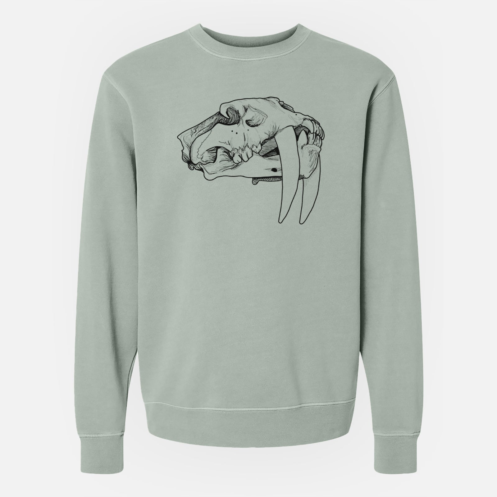 Sage green pigment dyed crewneck sweatshirt laid flat, printed with a detailed black ink illustration of a saber-toothed tiger skull.