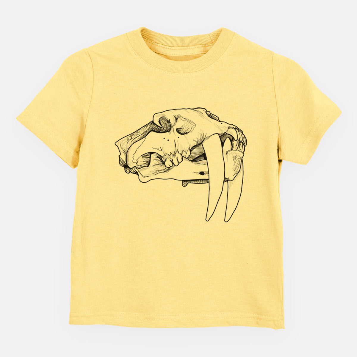 Butter yellow toddler t-shirt laid flat, printed with a detailed black ink illustration of a saber-toothed tiger skull.