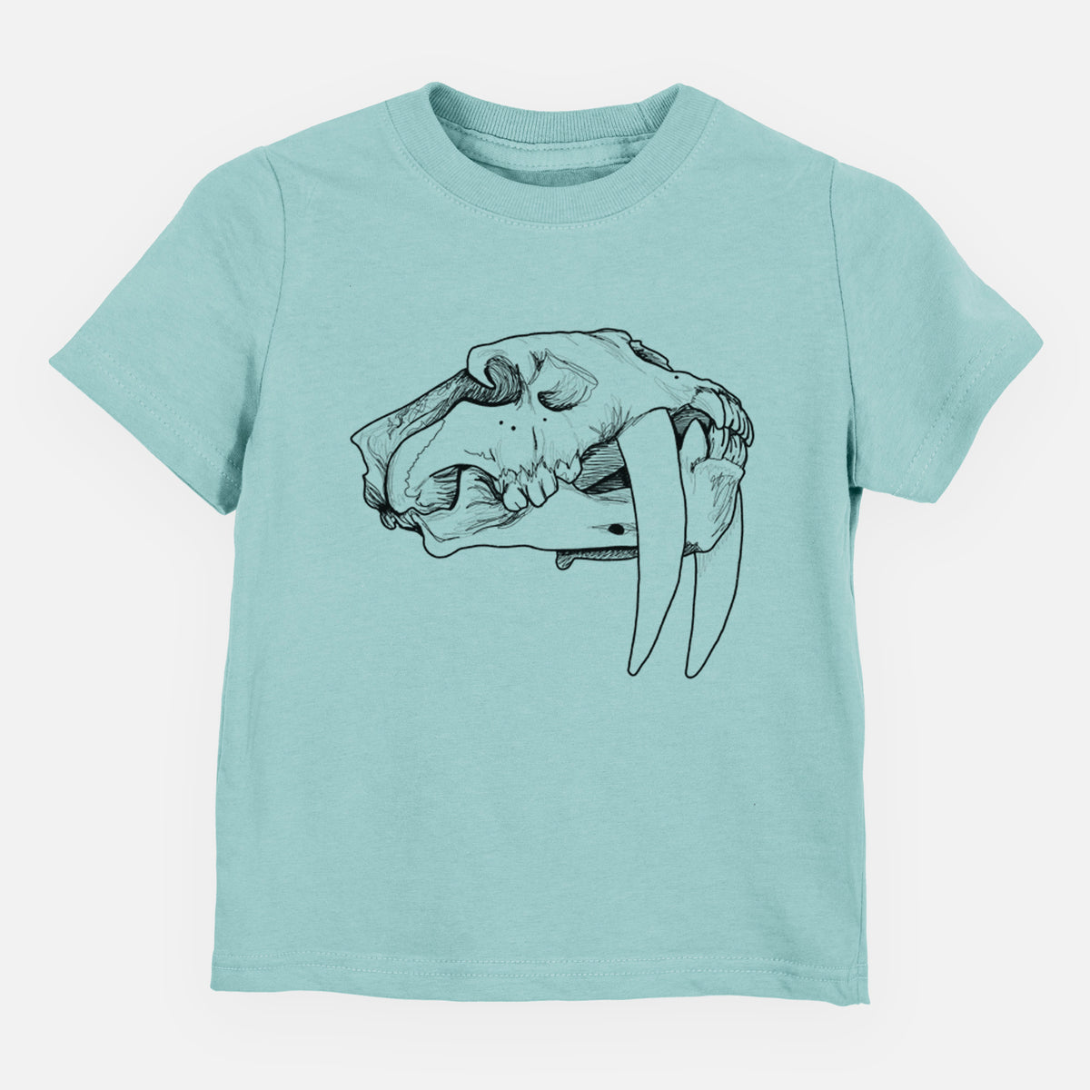 Saltwater toddler t-shirt laid flat, printed with a detailed black ink illustration of a saber-toothed tiger skull.