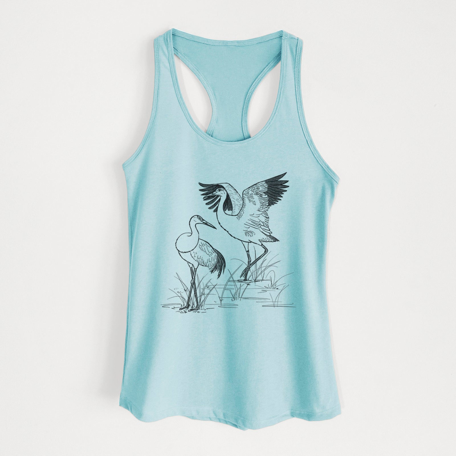 Cancun blue women's racerback tank top laid flat, printed with a black ink illustration of two sandhill cranes in marsh grass, one with its wings raised.