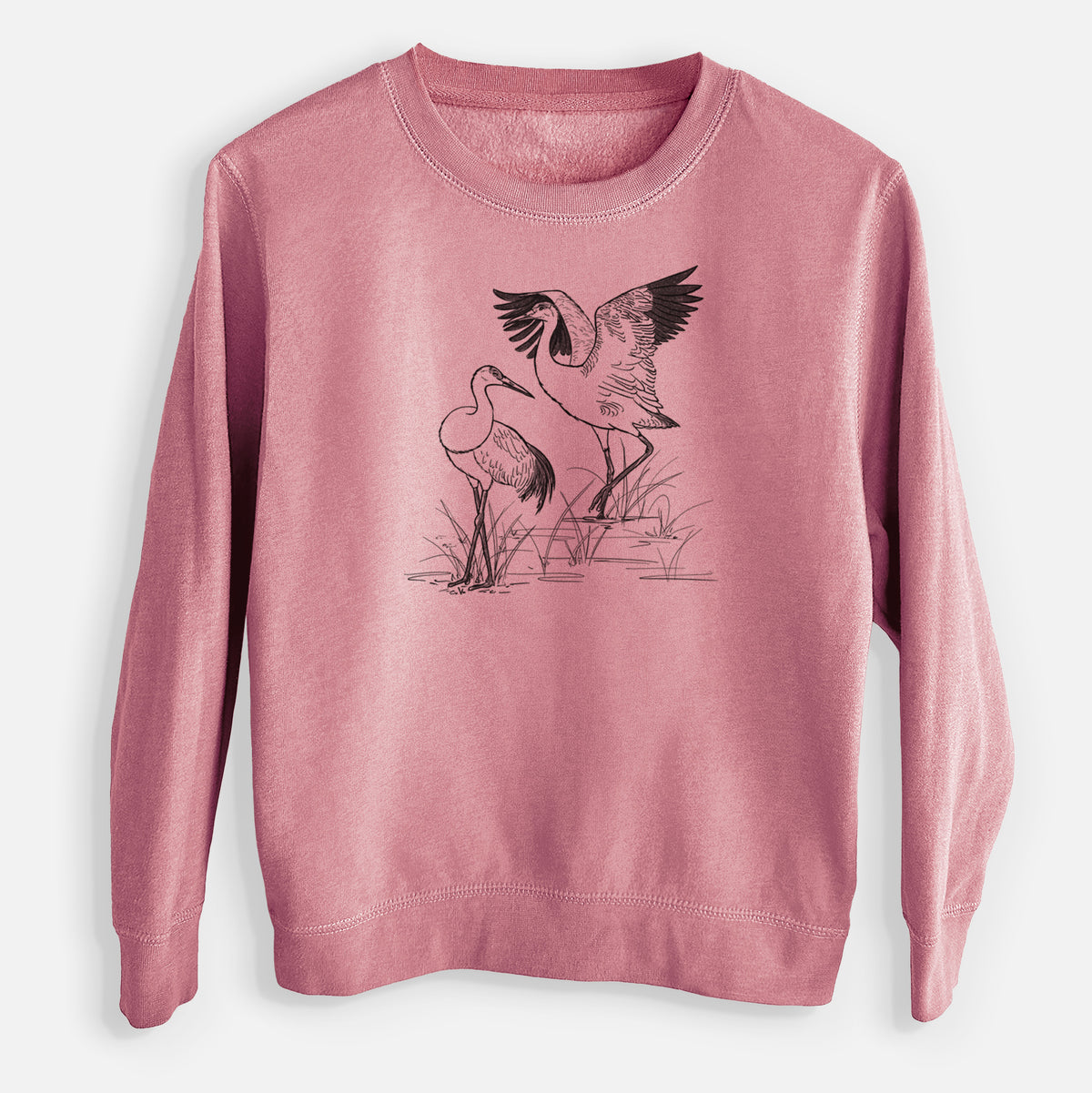 Mauve pink youth crewneck sweatshirt laid flat, printed with a black ink illustration of two sandhill cranes in marsh grass, one with its wings raised.