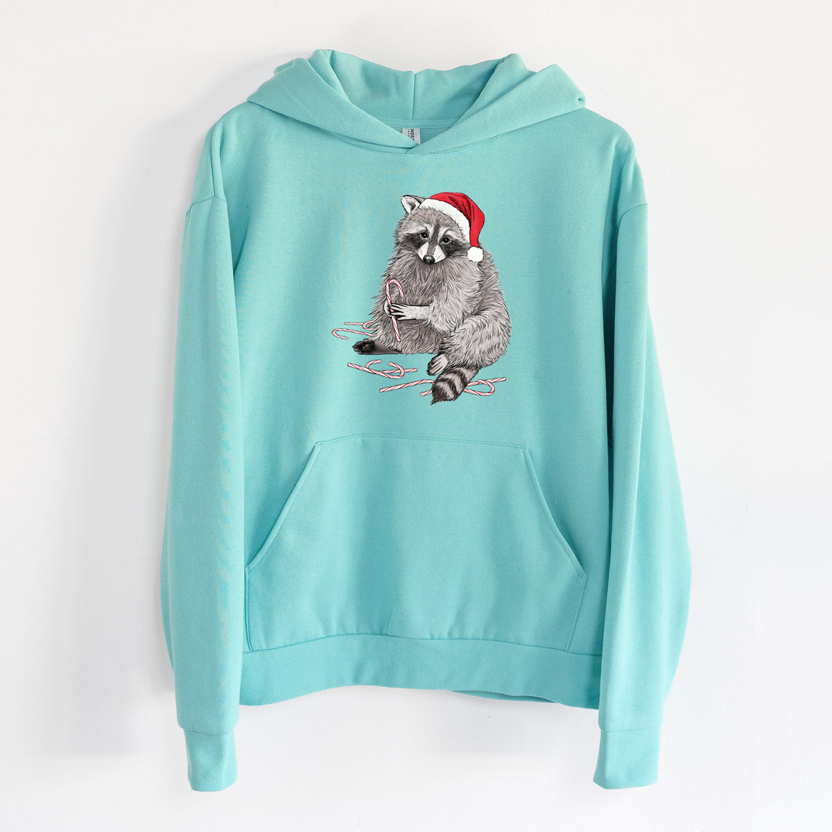 Santa Raccoon - Statement Midweight Hoodie in Seafoam, hanging on a white wall, with a front kangaroo pocket and no drawcords.