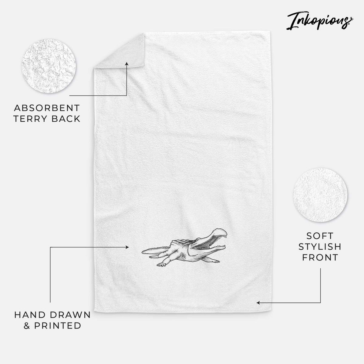 White hand towel printed with a black ink illustration of a Sarcosuchus, a giant prehistoric crocodile.