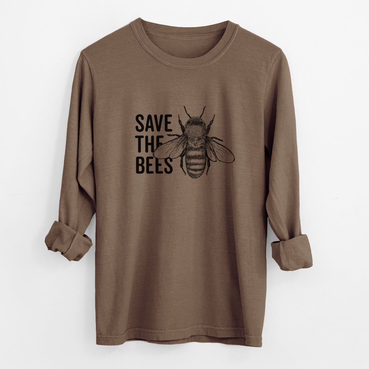 Espresso brown Comfort Colors long sleeve shirt laid flat with the cuffs rolled, printed with bold black words reading Save the Bees beside a detailed honey bee illustration.
