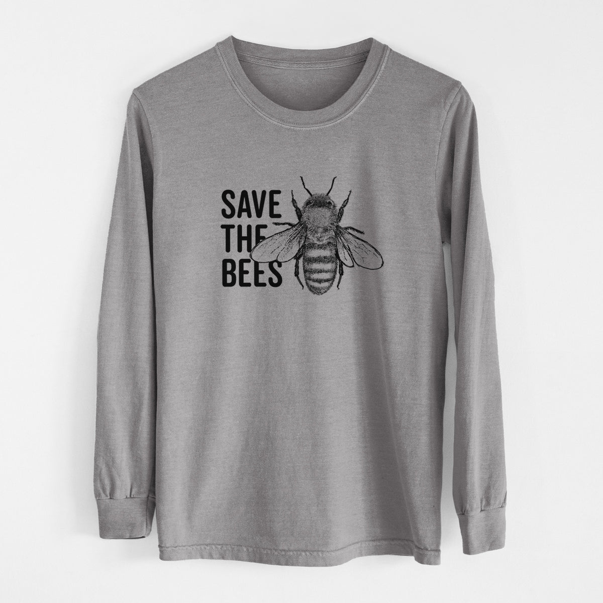 Grey Comfort Colors long sleeve shirt laid flat, printed with bold black words reading Save the Bees beside a detailed honey bee illustration.