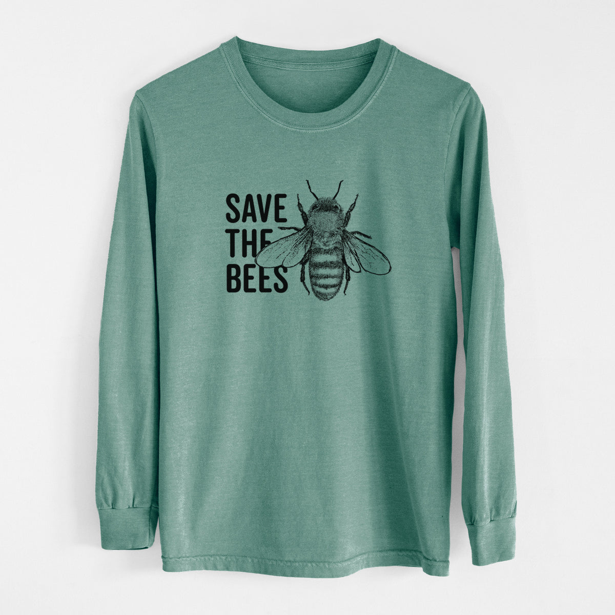 Pine green Comfort Colors long sleeve shirt laid flat, printed with bold black words reading Save the Bees beside a detailed honey bee illustration.