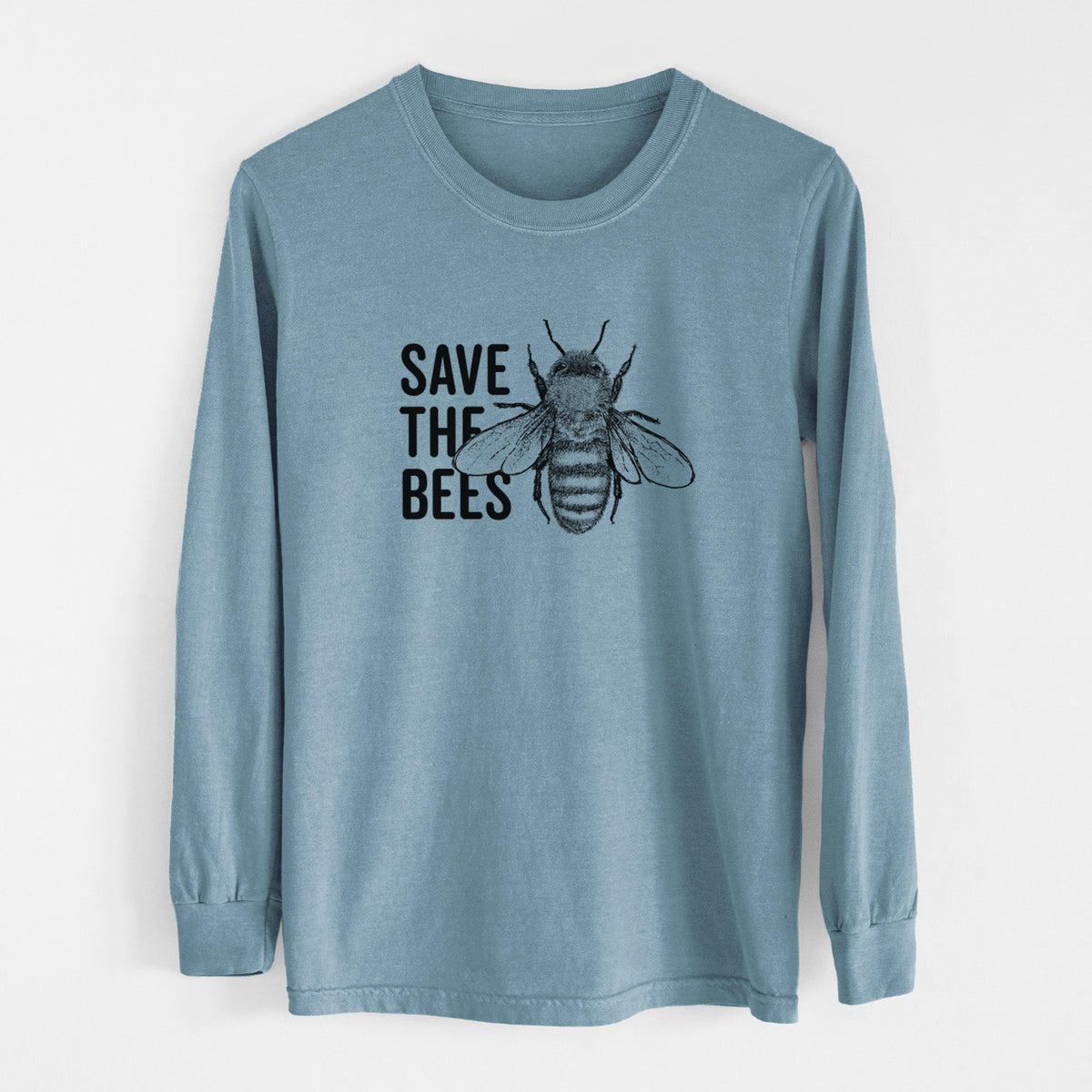 Steel blue Comfort Colors long sleeve shirt laid flat, printed with bold black words reading Save the Bees beside a detailed honey bee illustration.