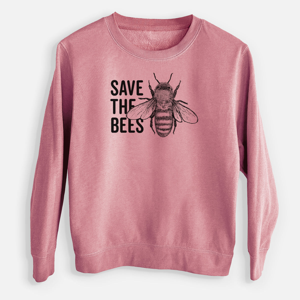 Mauve pink youth crewneck sweatshirt laid flat, printed with bold black words reading Save the Bees beside a detailed honey bee illustration.