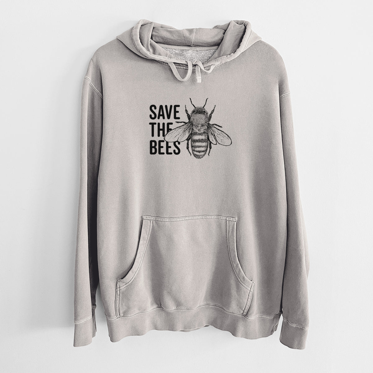 Cement grey pigment dyed hoodie laid flat, printed with bold black words reading Save the Bees beside a detailed honey bee illustration.