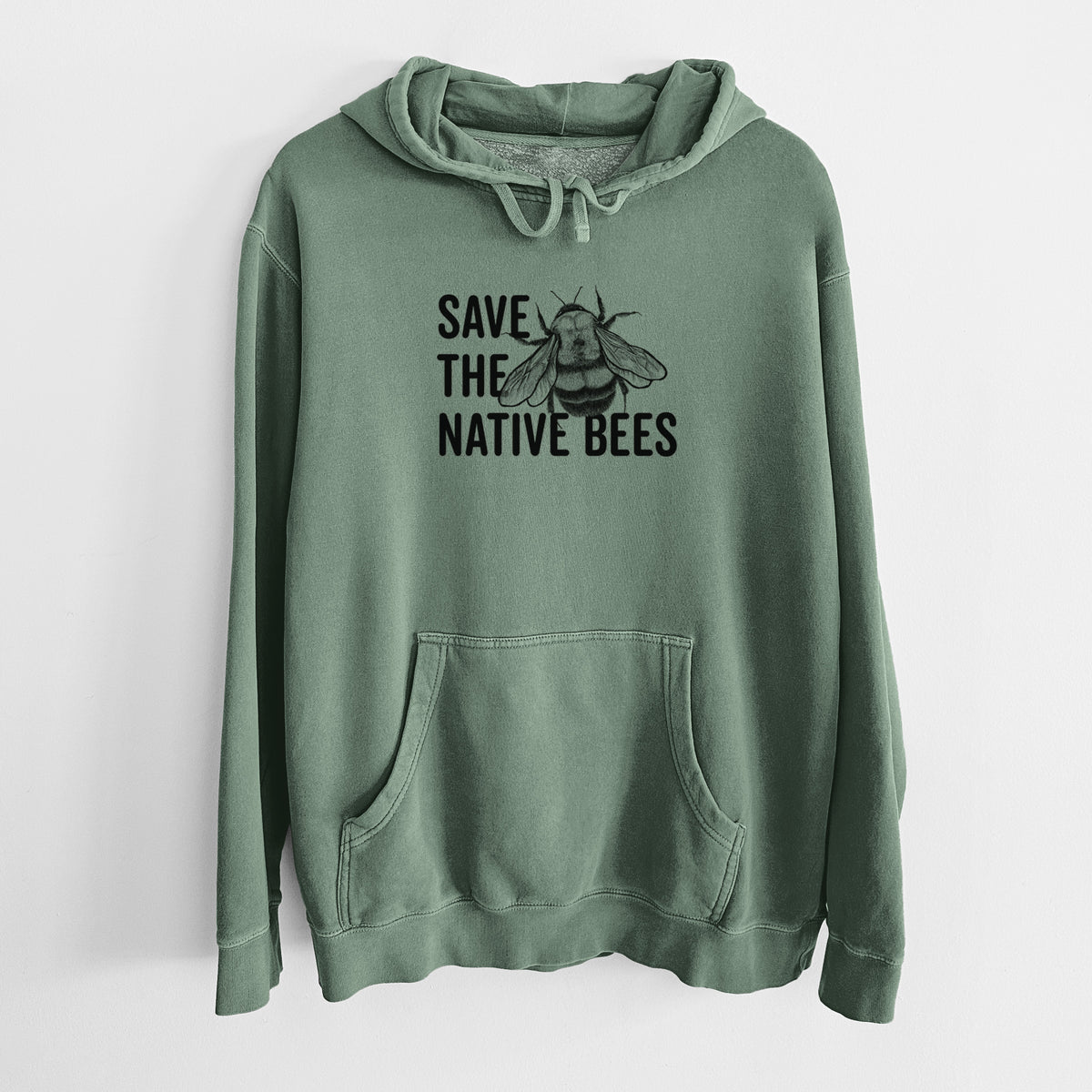 Alpine green pigment dyed hoodie laid flat, printed with bold black words reading Save the Native Bees beside a detailed bee illustration.