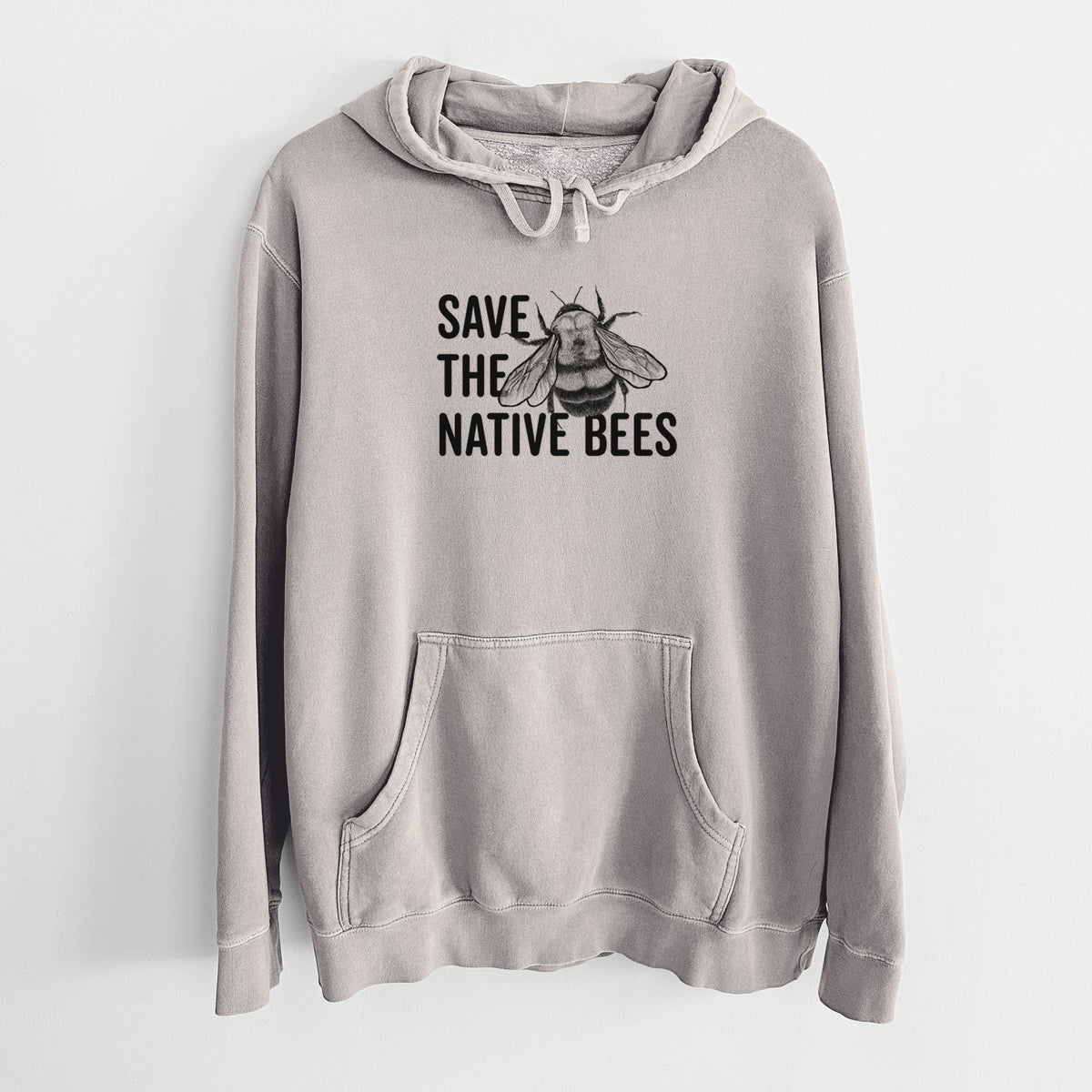 Cement grey pigment dyed hoodie laid flat, printed with bold black words reading Save the Native Bees beside a detailed bee illustration.