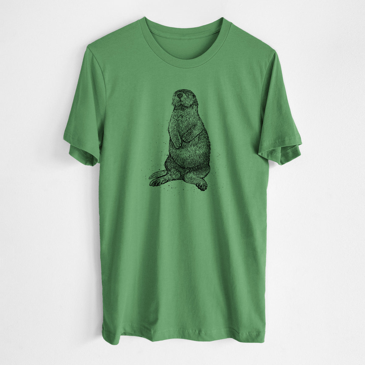 Leaf green lightweight cotton t-shirt laid flat, printed with a detailed black ink illustration of a sea otter sitting upright.