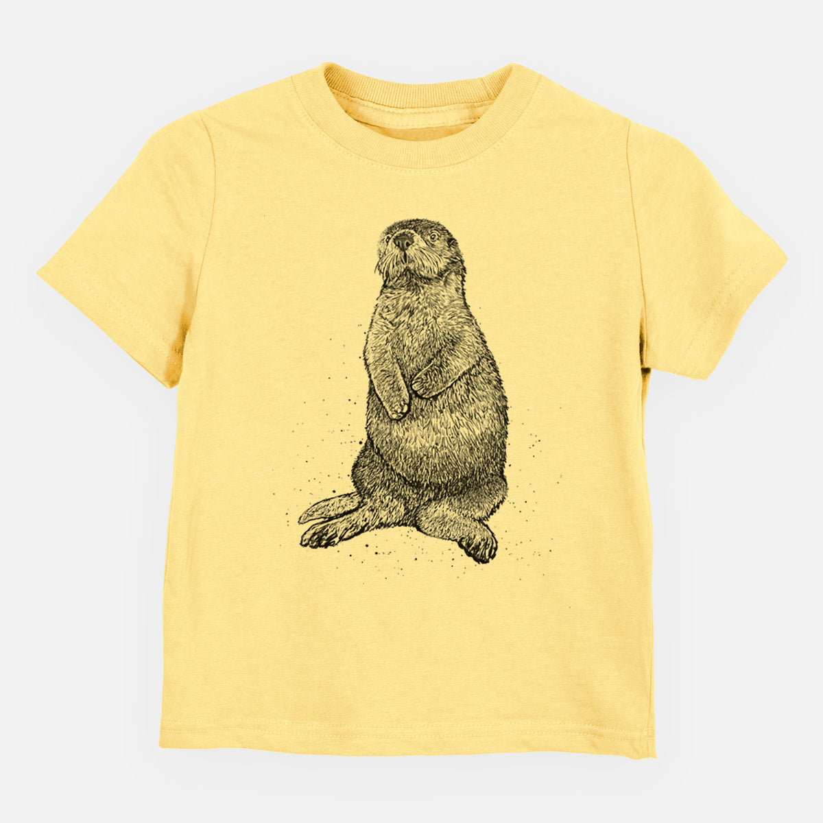 Butter yellow toddler t-shirt laid flat, printed with a detailed black ink illustration of a sea otter sitting upright.