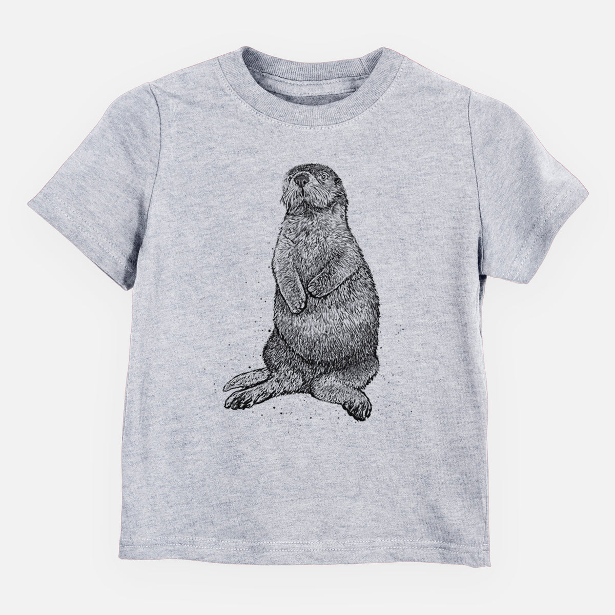 Heather grey toddler t-shirt laid flat, printed with a detailed black ink illustration of a sea otter sitting upright.