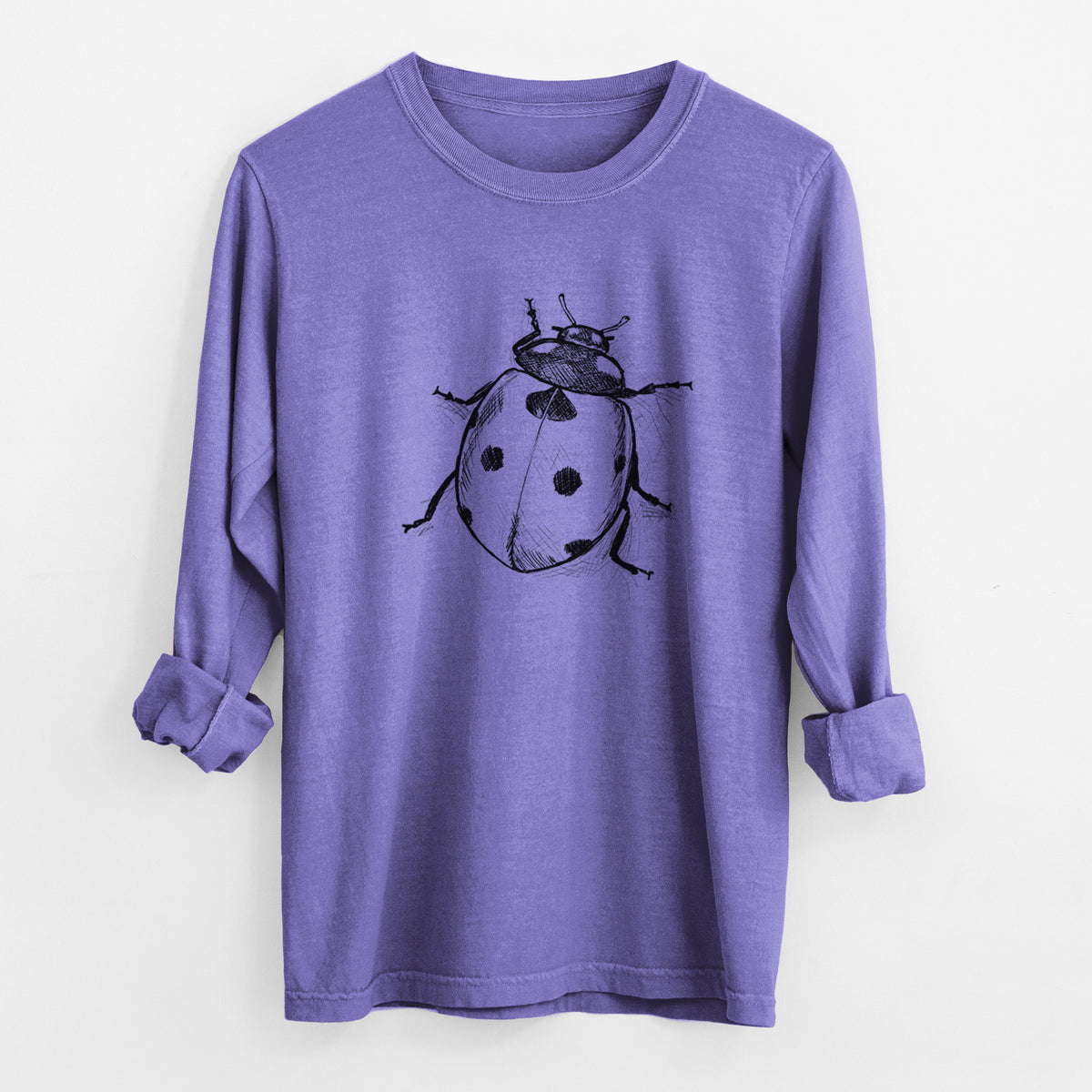 Violet purple Comfort Colors long sleeve shirt laid flat with the cuffs rolled, printed with a detailed black ink illustration of a seven-spot ladybird beetle.
