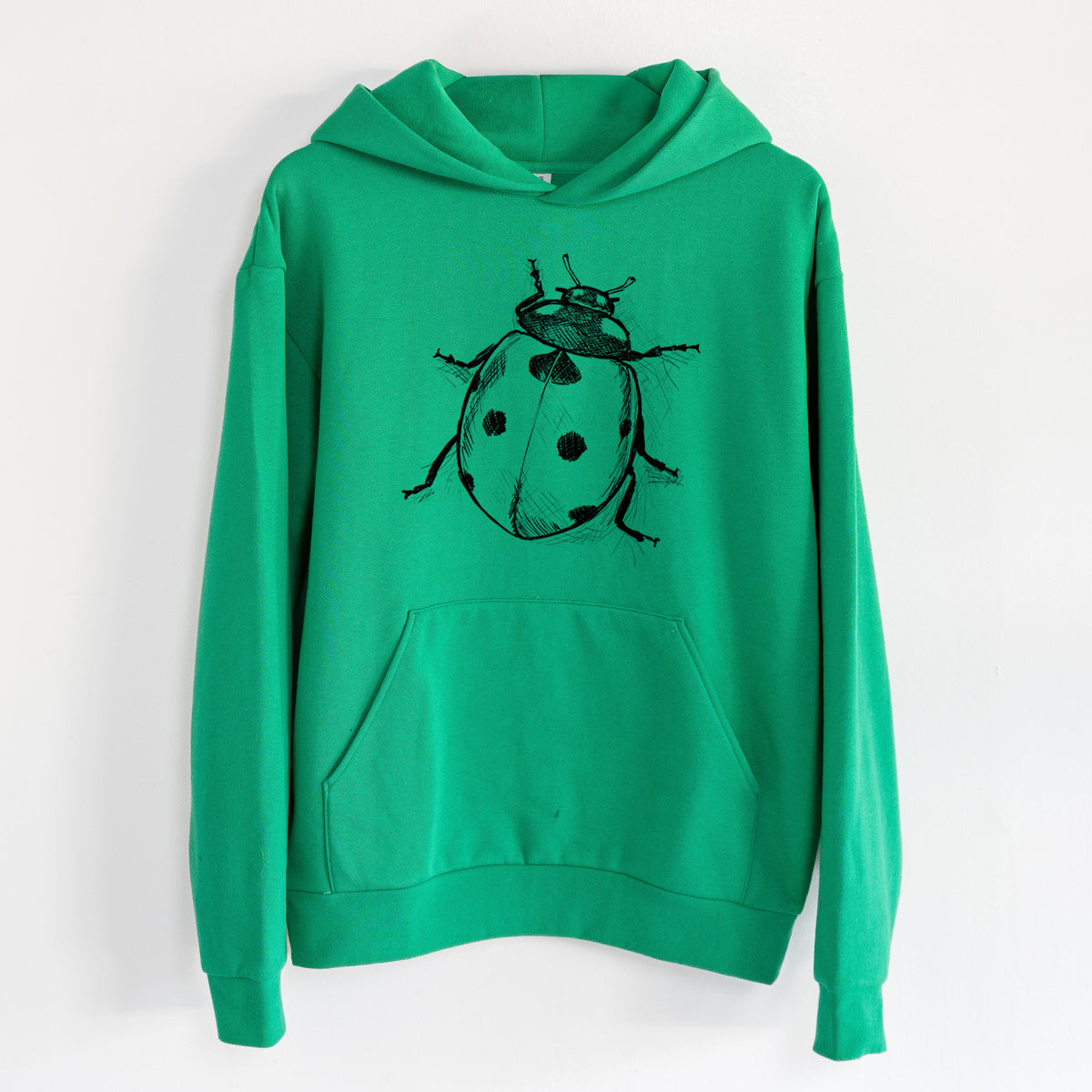 Coccinella septempunctata - Seven-spot Ladybird Ladybug - Statement Midweight Hoodie in Kelly Green, hanging on a white wall, with a front kangaroo pocket and no drawcords.