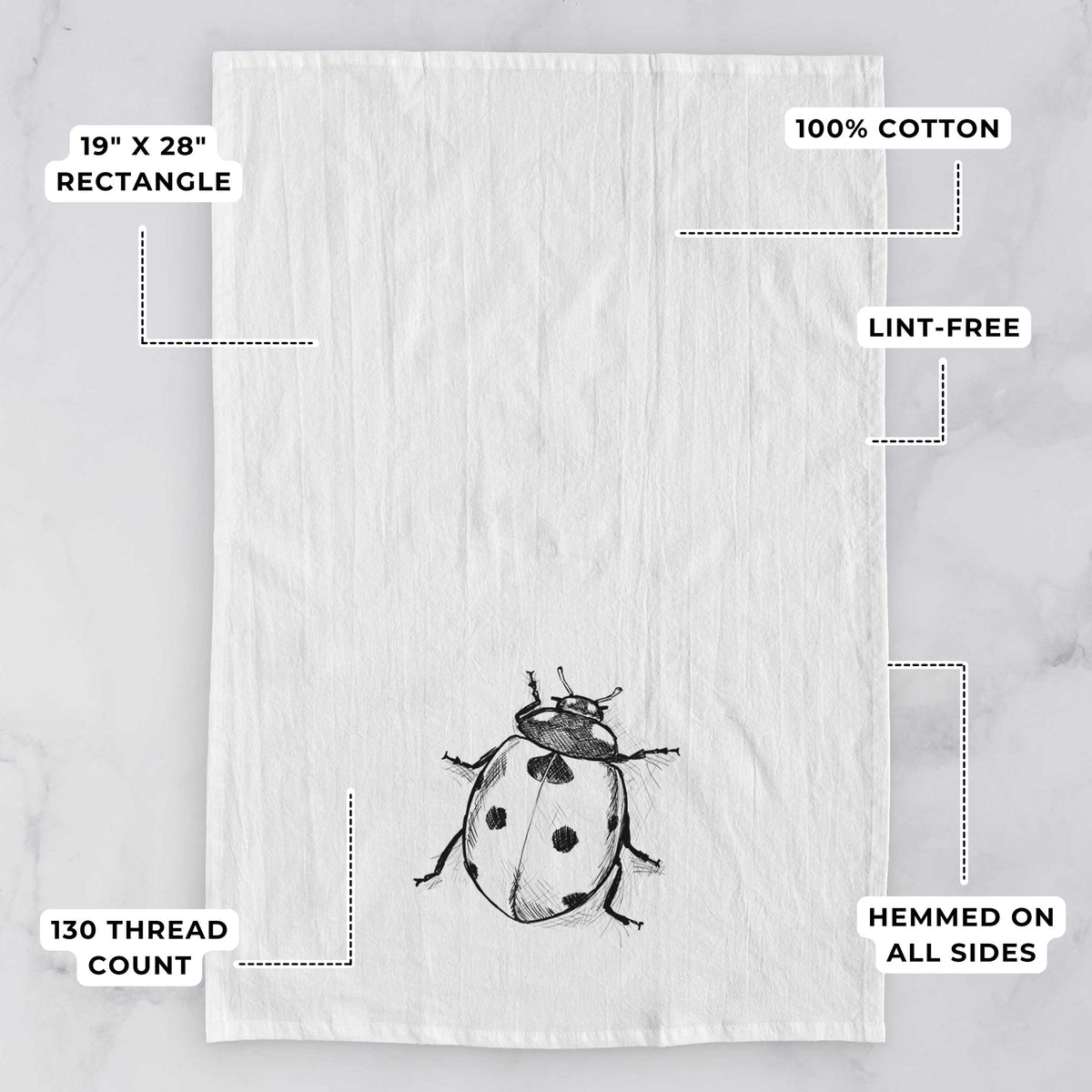 White tea towel printed with a detailed black ink illustration of a seven-spot ladybird beetle, with feature labels: 19 by 28 inch rectangle, 100% cotton, lint-free, 130 thread count, hemmed on all sides.