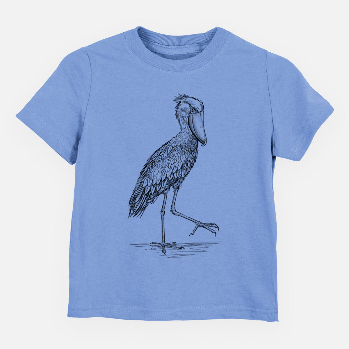 Carolina blue toddler t-shirt laid flat, printed with a black ink illustration of a shoebill stork standing on one leg.