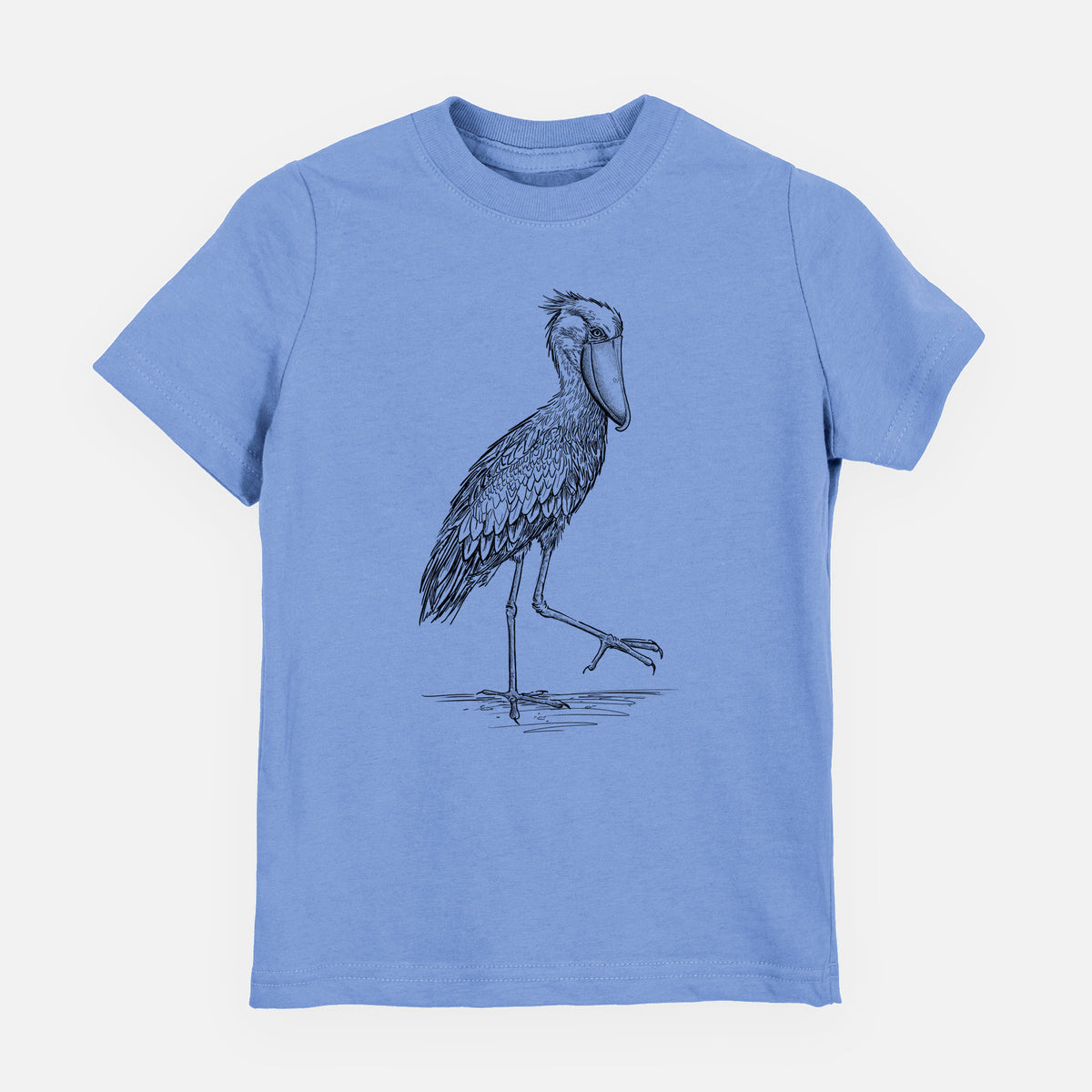 Carolina blue youth t-shirt laid flat, printed with a black ink illustration of a shoebill stork standing on one leg.