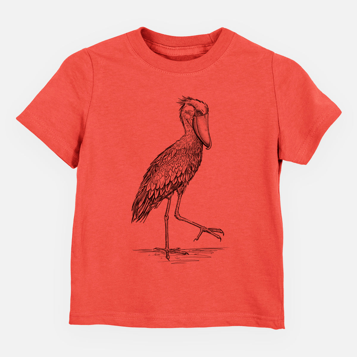 Passionfruit pink toddler t-shirt laid flat, printed with a black ink illustration of a shoebill stork standing on one leg.