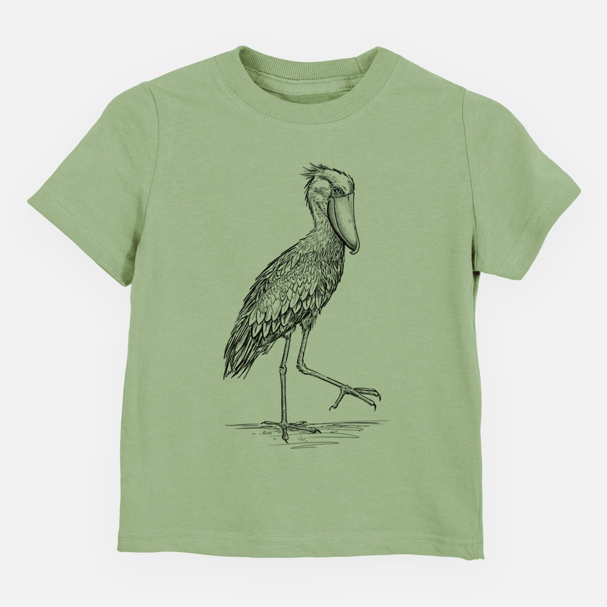 Sage green toddler t-shirt laid flat, printed with a black ink illustration of a shoebill stork standing on one leg.