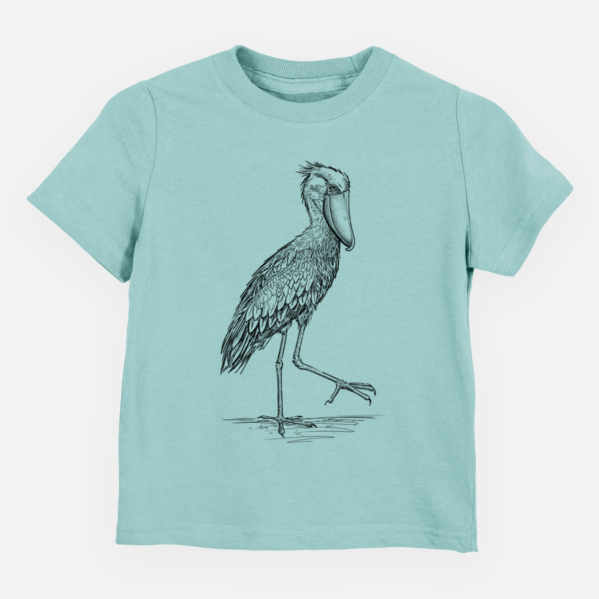 Saltwater toddler t-shirt laid flat, printed with a black ink illustration of a shoebill stork standing on one leg.