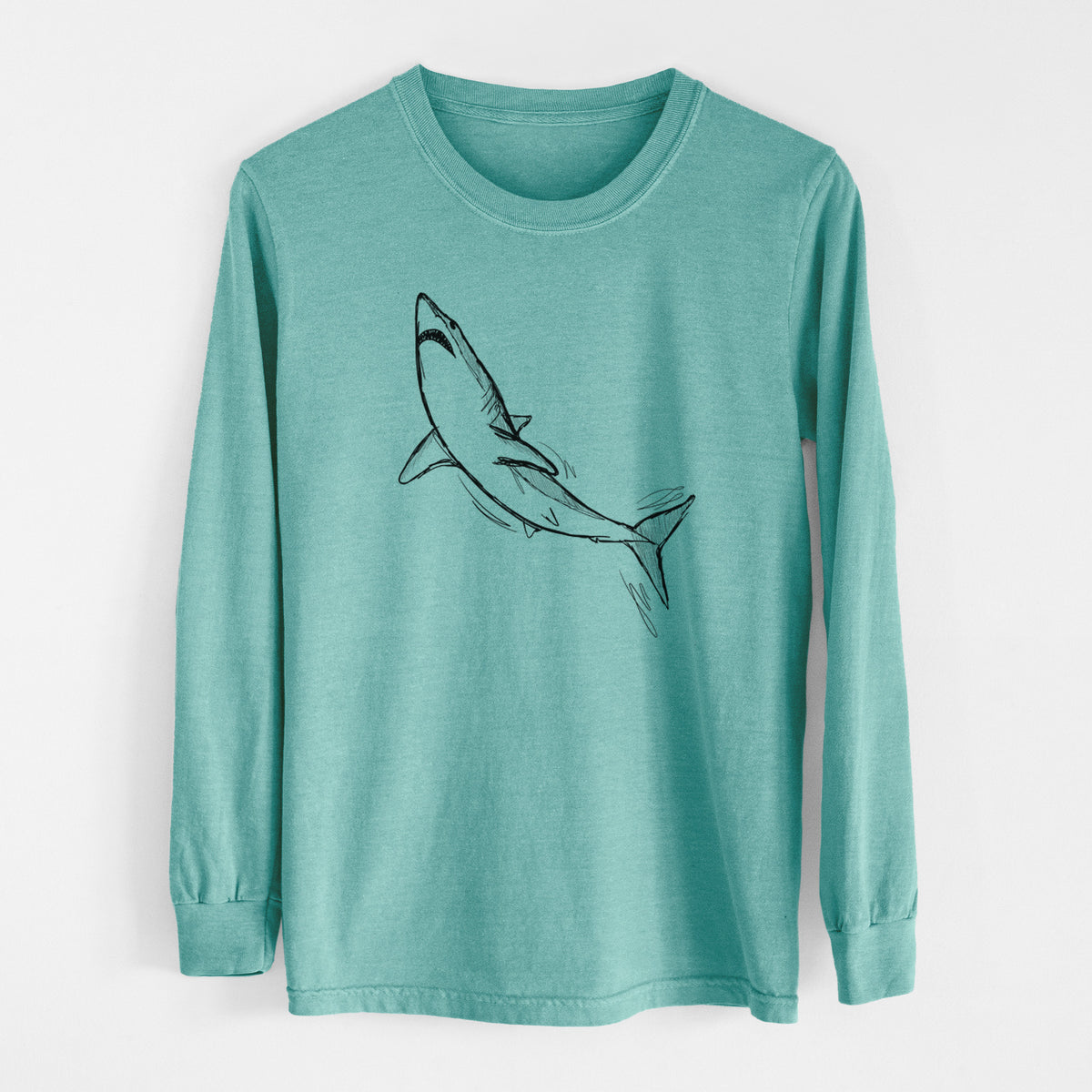 Reef green Comfort Colors long sleeve shirt laid flat, printed with a black ink illustration of a shortfin mako shark diving.