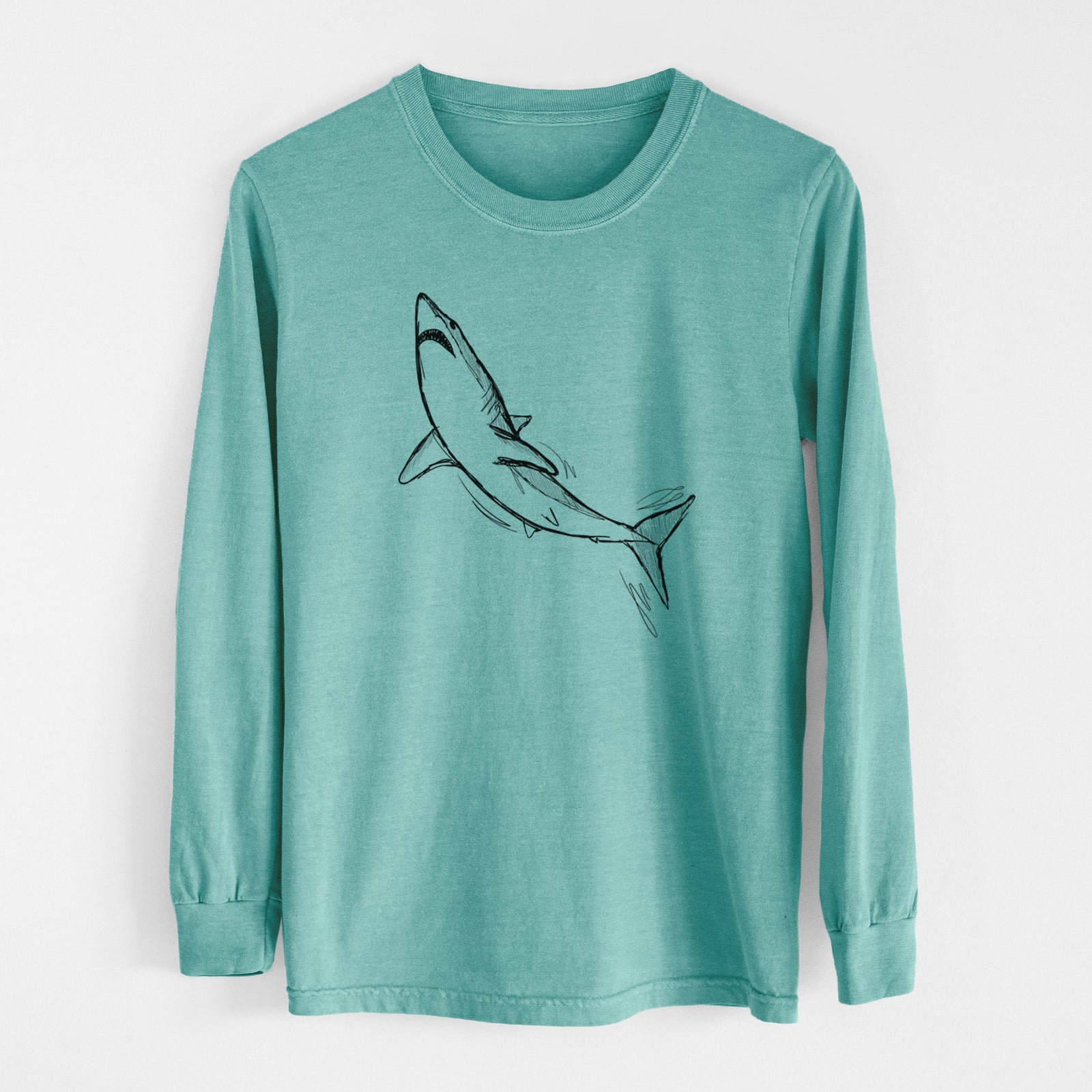 Reef green Comfort Colors long sleeve shirt laid flat, printed with a black ink illustration of a shortfin mako shark diving.