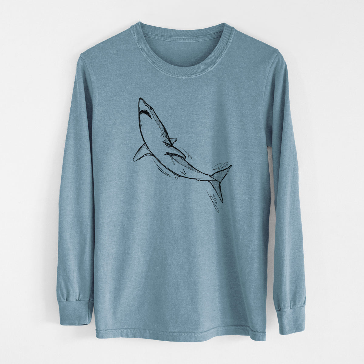 Steel blue Comfort Colors long sleeve shirt laid flat, printed with a black ink illustration of a shortfin mako shark diving.