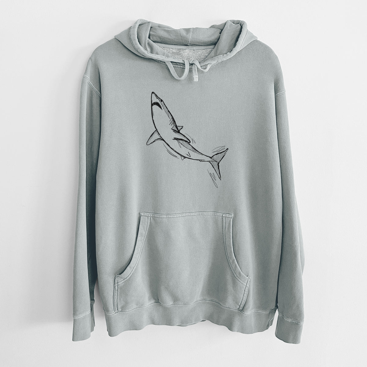 Sage green pigment dyed hoodie laid flat, printed with a black ink illustration of a shortfin mako shark diving.