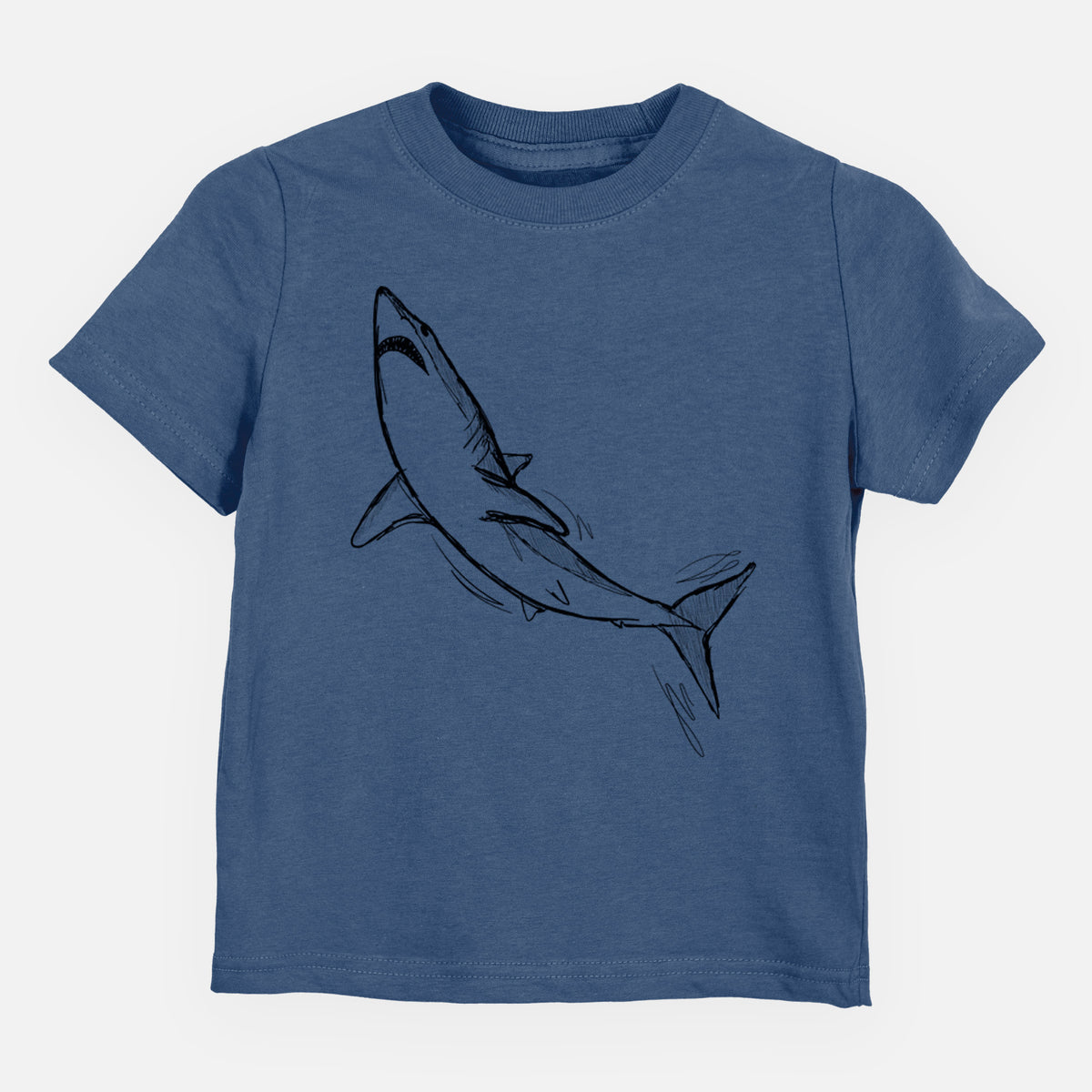 Indigo blue toddler t-shirt laid flat, printed with a black ink illustration of a shortfin mako shark diving.