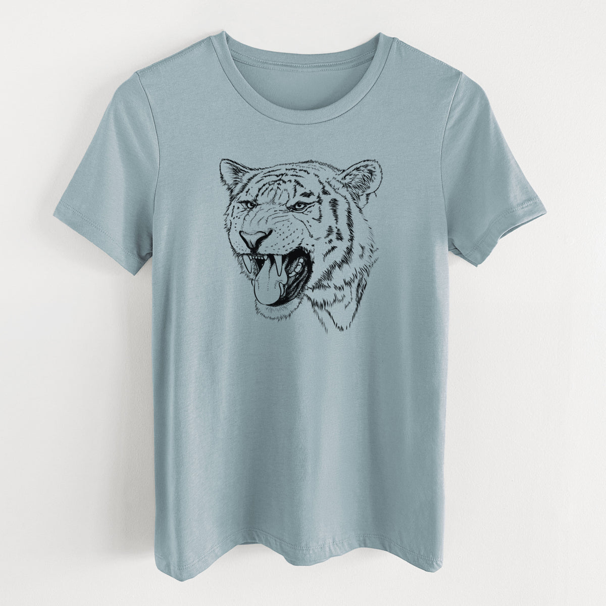 Vintage denim women's relaxed fit cotton t-shirt laid flat, printed with a detailed black ink portrait of a roaring Siberian tiger.