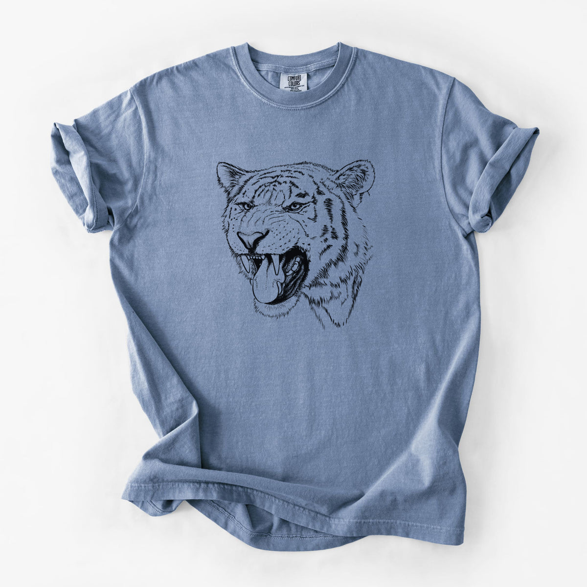 Blue jean Comfort Colors t-shirt laid flat, printed with a detailed black ink portrait of a roaring Siberian tiger.