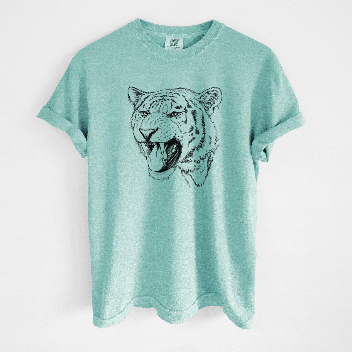 Chalky mint Comfort Colors t-shirt laid flat, printed with a detailed black ink portrait of a roaring Siberian tiger.