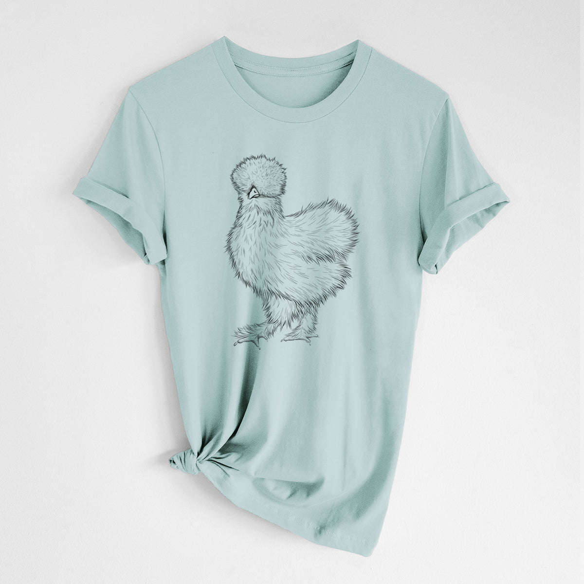 Dusty blue lightweight cotton t-shirt laid flat with the sleeves rolled, printed with a black ink illustration of a fluffy silkie chicken.