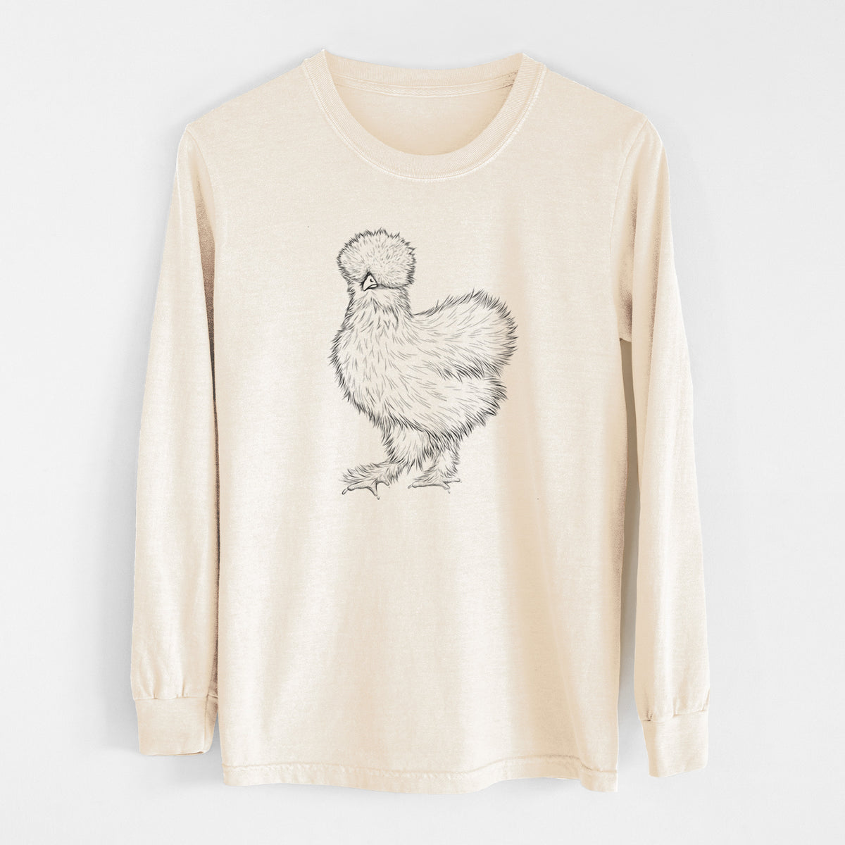 Ivory Comfort Colors long sleeve shirt laid flat, printed with a black ink illustration of a fluffy silkie chicken.
