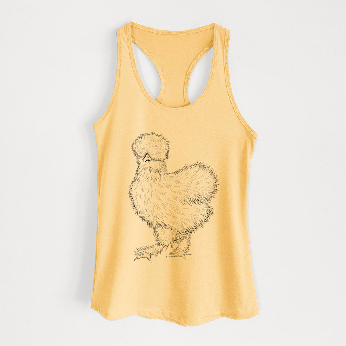 Banana cream women's racerback tank top laid flat, printed with a black ink illustration of a fluffy silkie chicken.