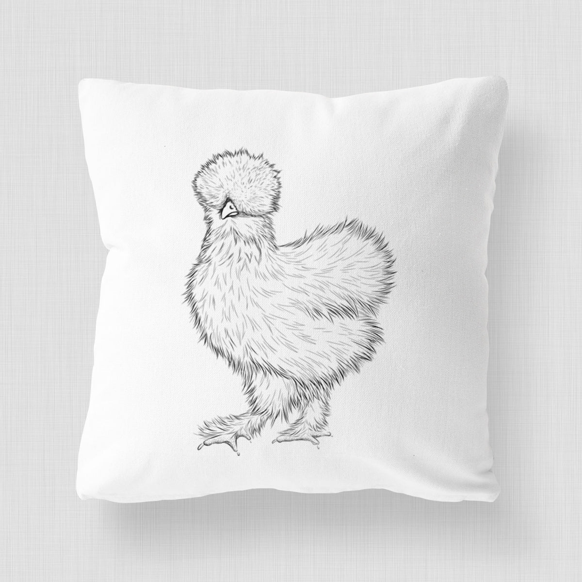 White pillow cover printed with a black ink illustration of a fluffy silkie chicken.