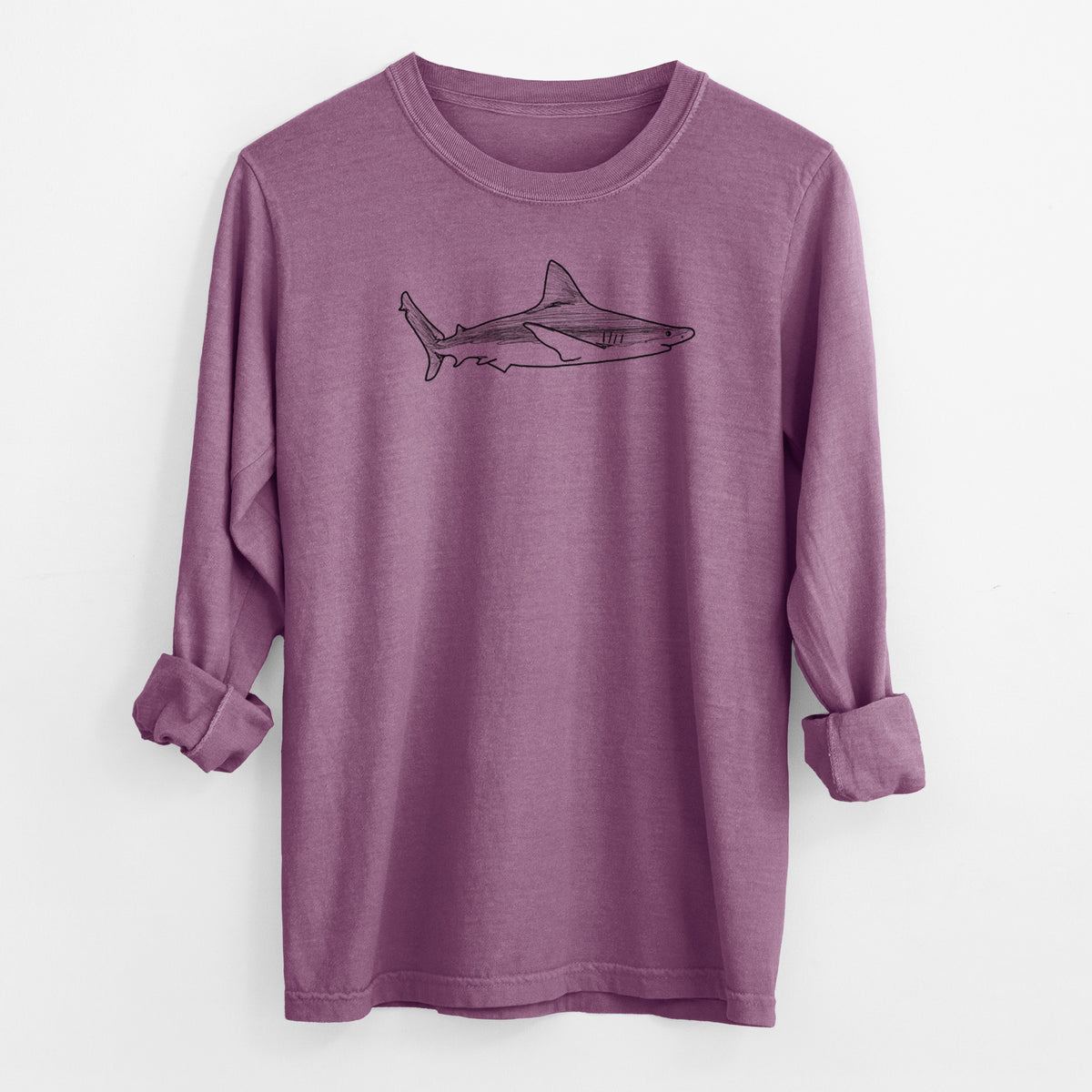 Berry pink Comfort Colors long sleeve shirt laid flat with the cuffs rolled, printed with a black ink illustration of a silvertip shark swimming in profile.