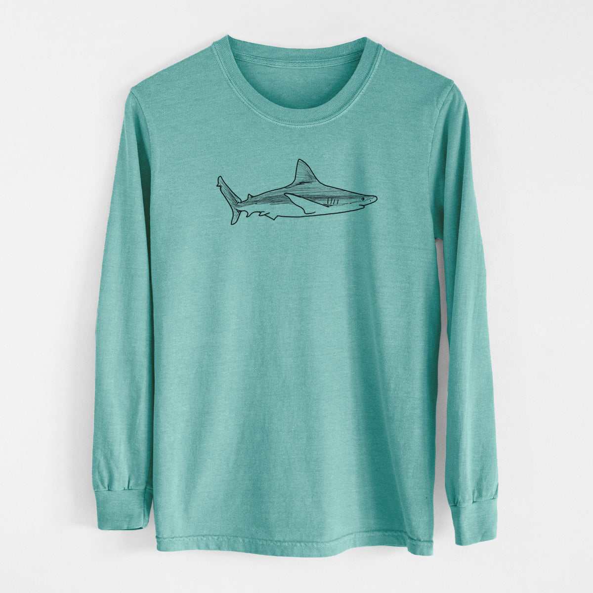 Reef green Comfort Colors long sleeve shirt laid flat, printed with a black ink illustration of a silvertip shark swimming in profile.