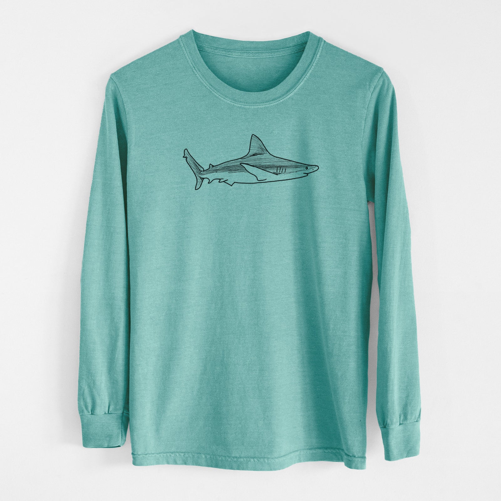 Reef green Comfort Colors long sleeve shirt laid flat, printed with a black ink illustration of a silvertip shark swimming in profile.