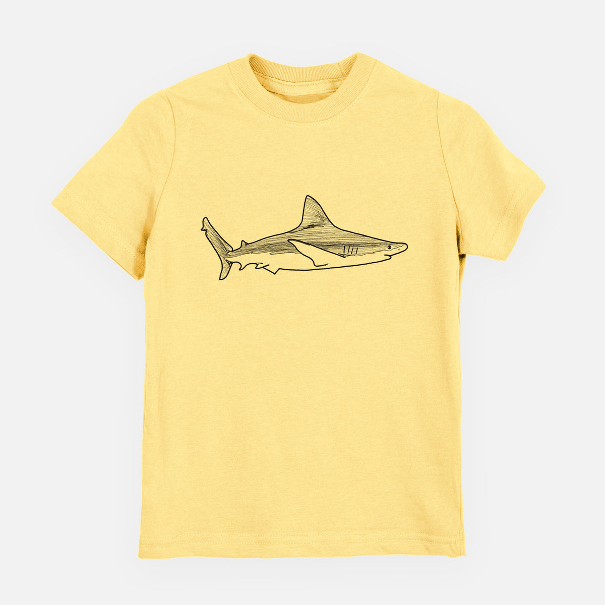 Butter yellow youth t-shirt laid flat, printed with a black ink illustration of a silvertip shark swimming in profile.