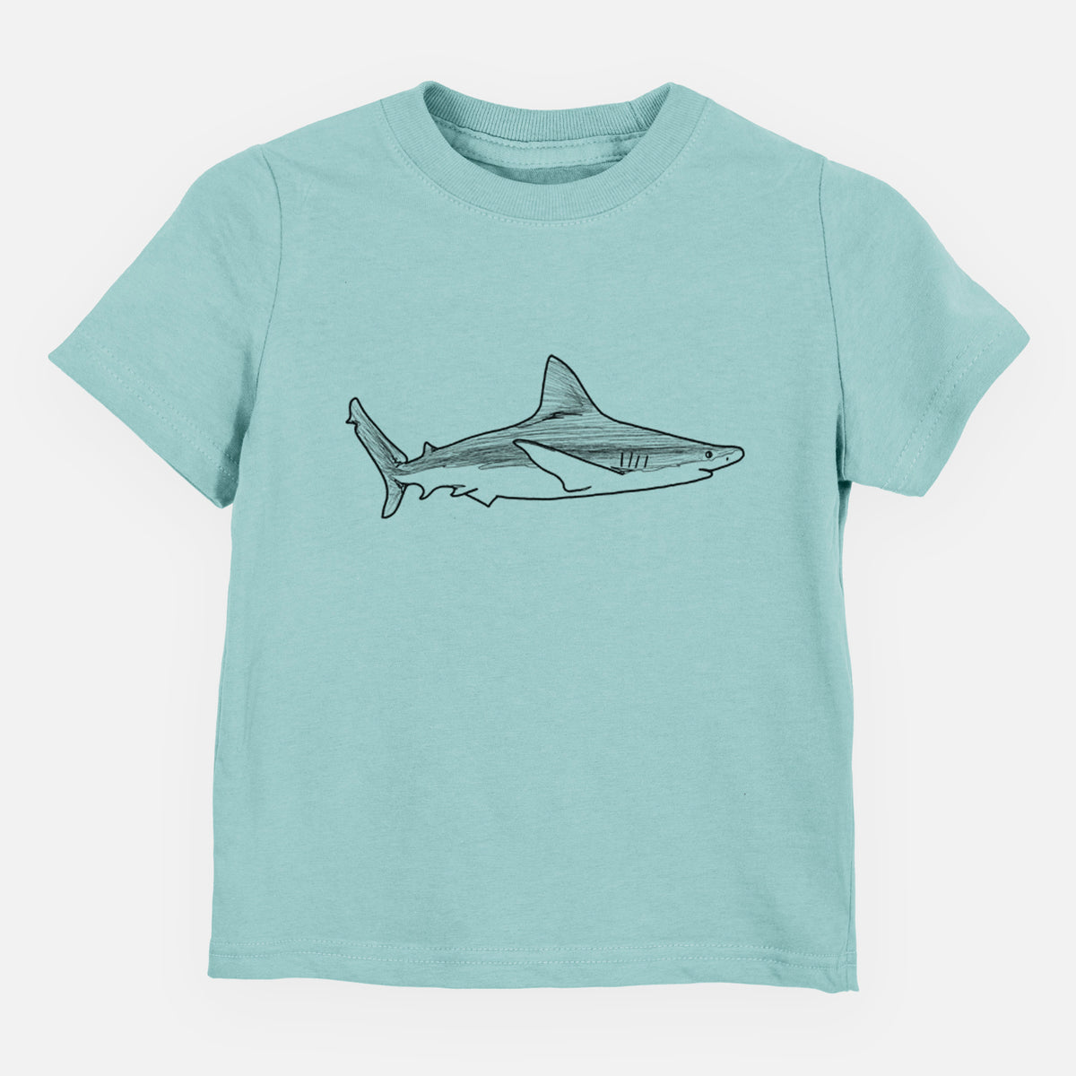Saltwater toddler t-shirt laid flat, printed with a black ink illustration of a silvertip shark swimming in profile.