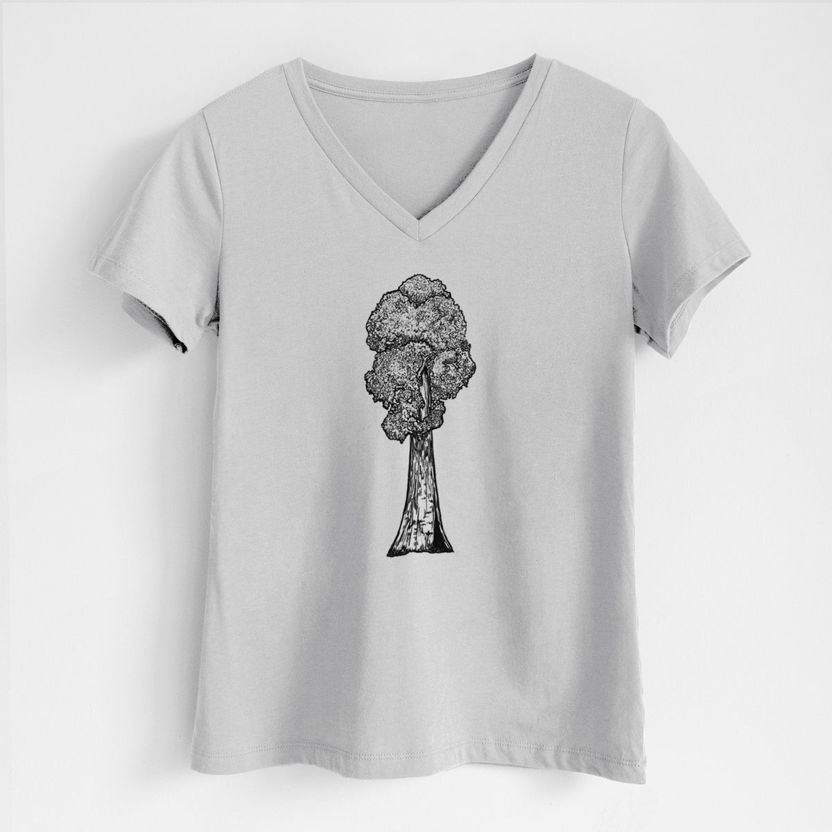 Lunar grey women's relaxed fit cotton V-neck t-shirt laid flat, printed with a black ink illustration of a single giant sequoia tree.