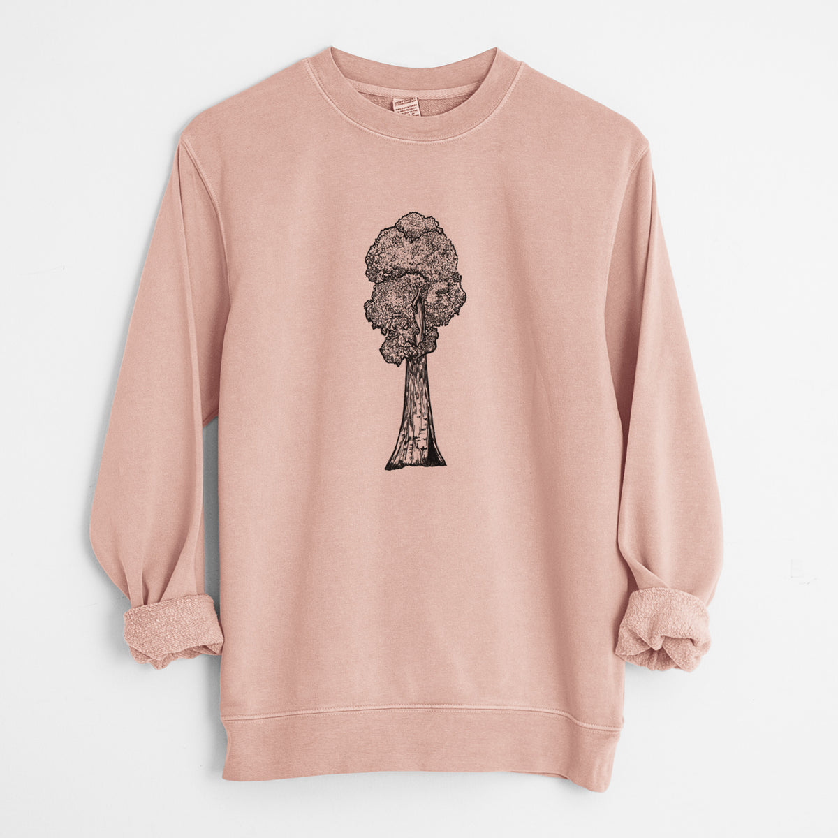 Dusty pink pigment dyed crewneck sweatshirt laid flat with the sleeves rolled, printed with a black ink illustration of a single giant sequoia tree.